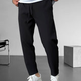 Elegantní tapered kalhoty s šňůrkou