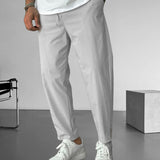 Elegantní tapered kalhoty s šňůrkou