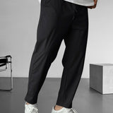 Elegantní tapered kalhoty s šňůrkou