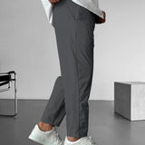 Elegantní tapered kalhoty s šňůrkou