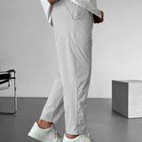 Elegantní tapered kalhoty s šňůrkou