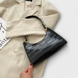 Cécile. - Lesklá kožená taška