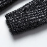 Elegantní pletený svetr s vysokým límcem