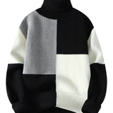 Elegantní svetr s vysokým límcem a patchworkem